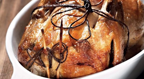 Утка, фаршированная апельсинами и травами