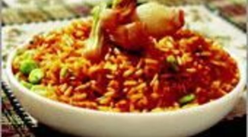 Полба в чугунной сковороде с куркумой