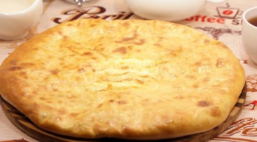 Картофель, фаршированный овощами