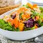 Салат с креветками, хурмой и орехами