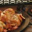 Пикантные цыплята целиком с персиками