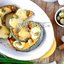 Тыквенные ломтики, запечённые с сыром и оливками