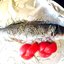 Сибас, запеченный с томатами