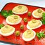 Яйца фаршированные пастой из вяленых томатов и грибов