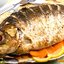 Карп в белом вине с овощами