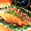 Карп, запечённый на луковой подушке