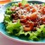 Салат с форелью и кедровыми орешками