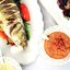 Сибас с мухурмой из грецких и таратором из кедровых орехов