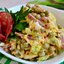 Салат из молодой капусты с копченой колбасой и горошком