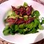Салат из авокадо, рукколы и анчоусов