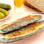 Сельдь, жаренная в панировочных сухарях, по-белорусски