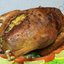 Жареный гусь фаршированный картофелем