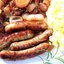 Сосиски с луковой подливкой